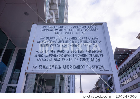 [Germany] A sign dividing East and West Germany at Checkpoint Charlie in Berlin 134247006