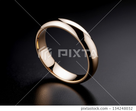 奢華簡約的背景，以金屬環和柔和的光暈漂浮在黑暗中——精緻的設計，非常適合用於標誌和品牌表達。 134248032