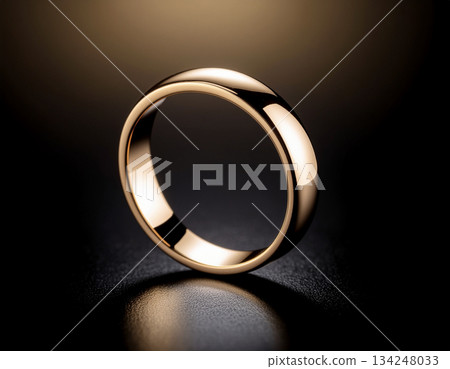 奢華簡約的背景,以金屬環和柔和的光暈漂浮在黑暗中——精緻的設計,非常適合用於標誌和品牌表達。 奢華簡約的背景,以金屬環和柔和的光暈漂浮在黑暗中——精緻的設計,非常適合用於標誌和品牌表達。 134248033