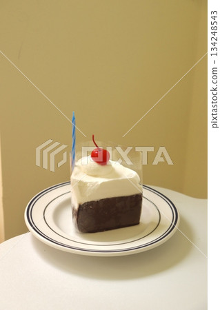 Rich and velvety chocolate cheesecake slice with a smooth, creamy texture and deep cocoa flavor. A perfect balance of indulgence and sweetness for a decadent dessert experience. Rich and velvety chocolate cheesecake slice with a smooth, creamy texture and deep cocoa flavor. A perfect balance of indulgence and sweetness for a decadent dessert experience. 134248543