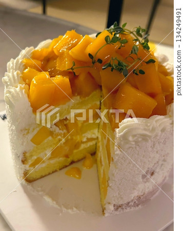 A delicious, fluffy cake with layers of rich flavor, perfect for any occasion. Often topped with frosting or fresh fruits, it's a sweet treat that brings joy to every bite. 134249491