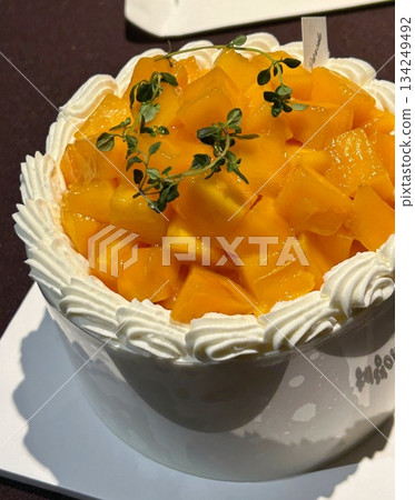 A delicious, fluffy cake with layers of rich flavor, perfect for any occasion. Often topped with frosting or fresh fruits, it's a sweet treat that brings joy to every bite. 134249492