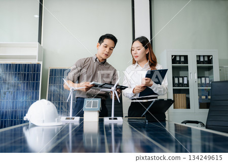 Cutting edge solar panel battery concept with our team of renewable energy engineers Cutting edge solar panel battery concept with our team of renewable energy engineers 134249615