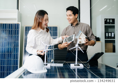 Cutting edge solar panel battery concept with our team of renewable energy engineers Cutting edge solar panel battery concept with our team of renewable energy engineers 134249631