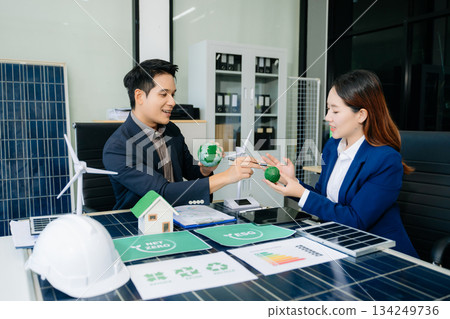 Business team people planning hand using laptop for working technology and business Net zero and carbon neutral concept. Business team people planning hand using laptop for working technology and business Net zero and carbon neutral concept. 134249736