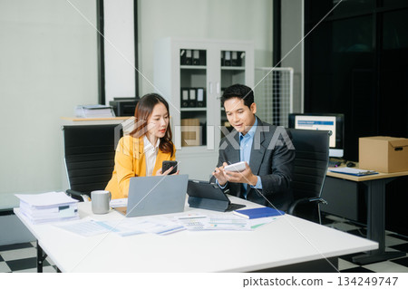 Portrait of success business people working together in modern office. Business teamwork startup Portrait of success business people working together in modern office. Business teamwork startup 134249747