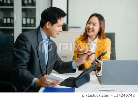 Portrait of success business people working together in modern office. Business teamwork startup Portrait of success business people working together in modern office. Business teamwork startup 134249748