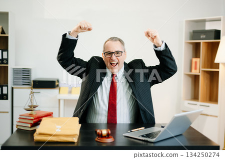 Justice and law concept.Male judge in a courtroom on white table and Counselor or Male lawyer working in office. Justice and law concept.Male judge in a courtroom on white table and Counselor or Male lawyer working in office. 134250274