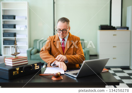 Male judge in courtroom, lawyer working in office. Perfect for business, legal advice, corporate law 134250278