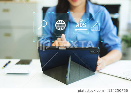 Digital marketing commerce online sale concept, woman using tablet, laptop with Ads and sales. Digital marketing commerce online sale concept, woman using tablet, laptop with Ads and sales. 134250766