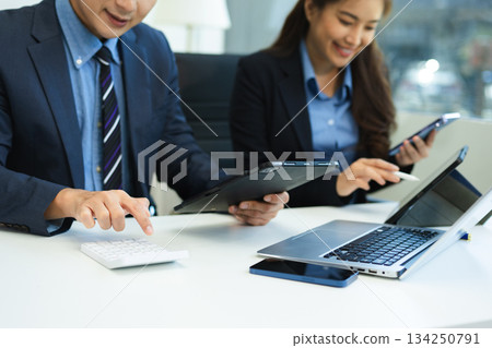 Business team meeting. professional investor working new start up project. Finance task. with smart phone and laptop and digital tablet 134250791