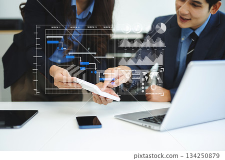 Business hand Project manager working and update tasks and Gantt chart scheduling virtual diagram. 134250879