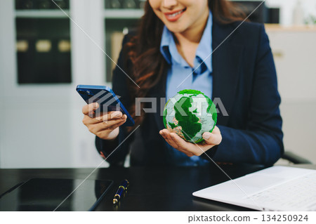 Business working with reduce CO2 concept with icons, global warming such as reforest green factory recycle and zero carbon dioxide emission concept. 134250924
