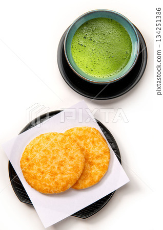 Japanese snacks: soy sauce rice crackers and matcha 134251386