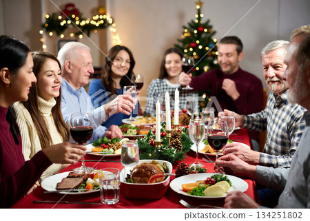 Family at the festive table 134251802