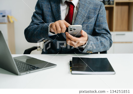 Businessman s hands typing on smartphone, tablet and laptop keyboard computer, 134251851