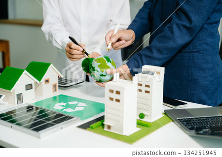 business team people planning and discussing on recycle reduce reuse policy symbol in office meeting room. business team people planning and discussing on recycle reduce reuse policy symbol in office meeting room. 134251945