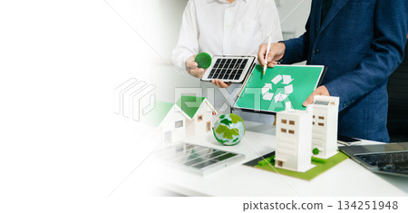 Business team people planning hand using laptop for working technology and business Net zero and carbon neutral 134251948