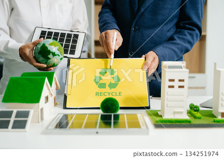 Business team people planning hand using laptop for working technology and business Net zero and carbon neutral 134251974