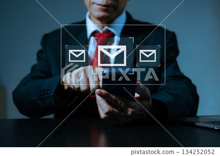 Man hands using Laptop, tablet typing on keyboard and surfing the internet with email icon, email marketing concept, send e-mail 134252052