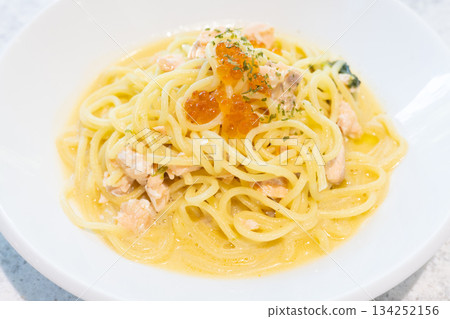 Delicious salmon cream pasta topped with salmon roe 134252156