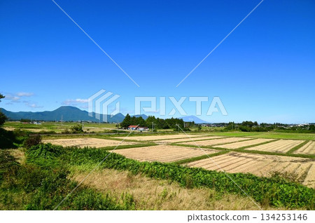 The Tohoku Main Line and the Ou Mountains seen from the rice paddies of Shiwa Town The Tohoku Main Line and the Ou Mountains seen from the rice paddies of Shiwa Town 134253146