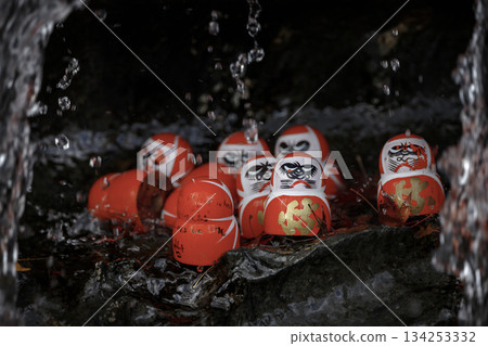 Small red Daruma dolls in Katsuoji Temple. A Traditional red Daruma doll is used as a symbol of determination in Japanese culture at Katsuo-ji temple, Osaka, Japan 134253332