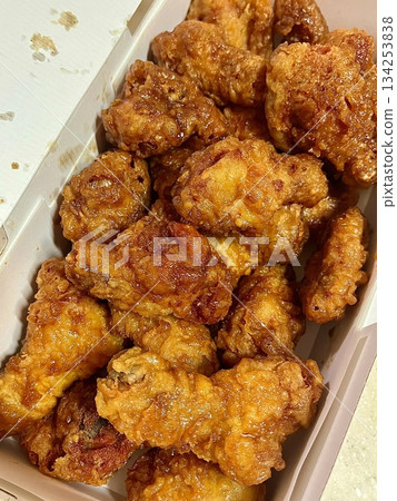 Crispy Korean fried chicken, perfectly glazed with a sweet and spicy sauce. Ideal for food photography and menus, showcasing the irresistible crunch and flavor of this beloved dish. Crispy Korean fried chicken, perfectly glazed with a sweet and spicy sauce. Ideal for food photography and menus, showcasing the irresistible crunch and flavor of this beloved dish. 134253838