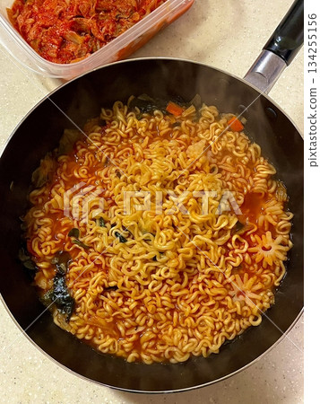 Shin Ramyun,close up of Ramyeon or Ramyun is a Korean-style soup noodle dish with a spicy flavor. Ramyeon or Korean instant noodles with egg - Korean food style 134255156