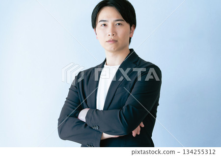 Businessman with arms folded 134255312