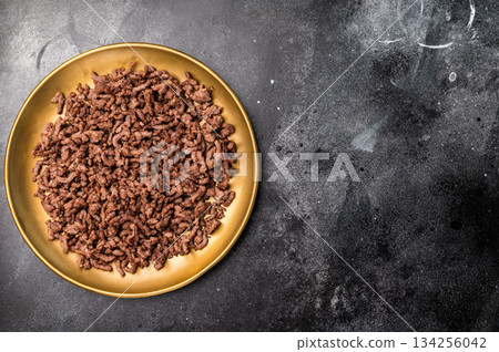 Roast and Fried mince meat, fresh cooked ground meat in a plate. black background. top view 134256042