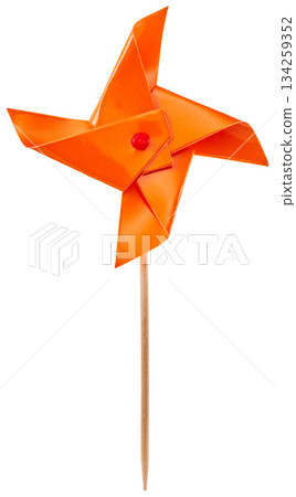 Orange windmill toy (with wooden stick, white background) 134259352