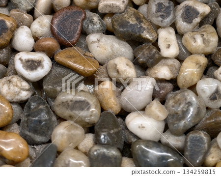 vividly tinted multihued stones with different polish degrees suitable for landscaping and artistic 134259815