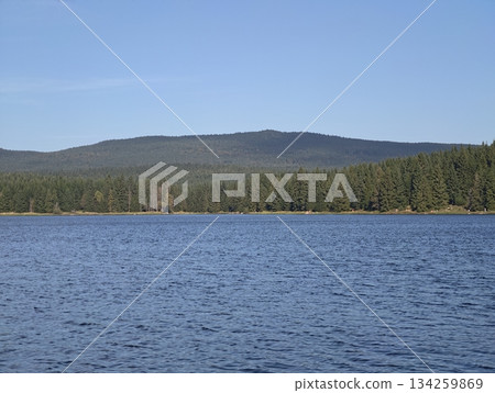 vast mountain water body surrounded by verdant hills offers tranquil hiking opportunities and scenic 134259869