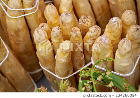 White yellow garden asparagus displayed at food marked, closeup detail White yellow garden asparagus displayed at food marked, closeup detail 134260084