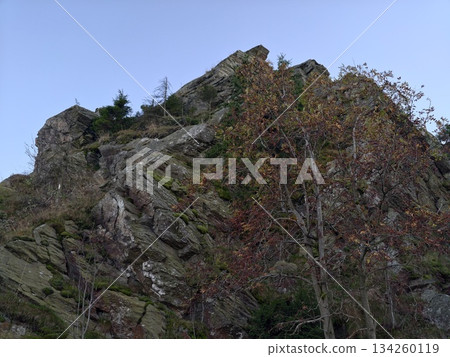 scenic wilderness area featuring sharp granite formations and sparse vegetation for adventure 134260119