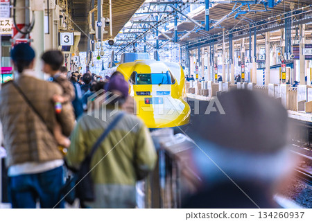 A rare sight in the cityscape of Yokohama, Japan. At Shin-Yokohama Station, the Shinkansen train Doctor Yellow, which brings good luck. To a happy future. 134260937