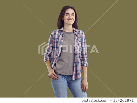 Portrait of smiling young woman in casual clothes Portrait of smiling young woman in casual clothes 134261971