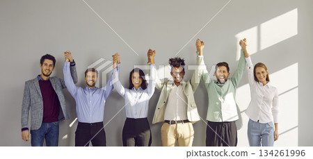 Banner with team of joyful, smiling multiracial business people having fun in office Banner with team of joyful, smiling multiracial business people having fun in office 134261996