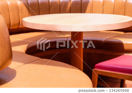 Wooden chairs and tables in a cafe Wooden chairs and tables in a cafe 134265048