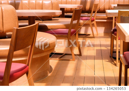 Wooden chairs and tables in a cafe Wooden chairs and tables in a cafe 134265053