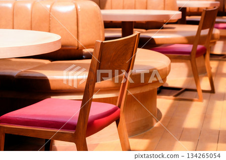 Wooden chairs and tables in a cafe Wooden chairs and tables in a cafe 134265054
