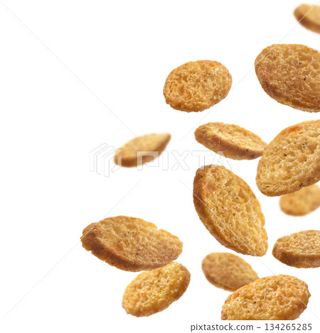 Bread croutons levitate on a white background Bread croutons levitate on a white background 134265285