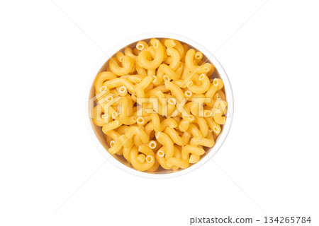 A bowl of yellow pasta with a white background A bowl of yellow pasta with a white background 134265784
