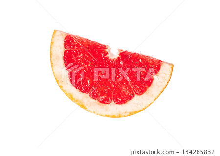 A slice of red grapefruit is shown on a white background 134265832