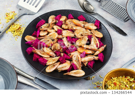 Prawns shrimps roasted with dragon fruit. Prawns shrimps roasted with dragon fruit. 134266544