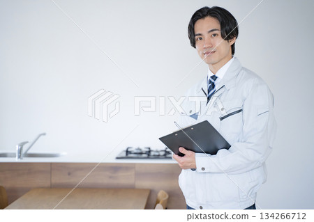 Male worker inspecting the kitchen 134266712