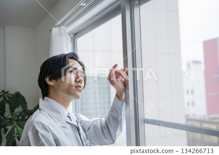 Inspecting worker, male, house Inspecting worker, male, house 134266713