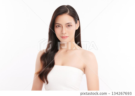 A beautiful young Asian woman with clean, fresh skin against a white background. Skincare, facial treatment, cosmetology, beauty, and spa. An elegant portrait of an Asian woman. A beautiful young Asian woman with clean, fresh skin against a white background. Skincare, facial treatment, cosmetology, beauty, and spa. An elegant portrait of an Asian woman. 134267693