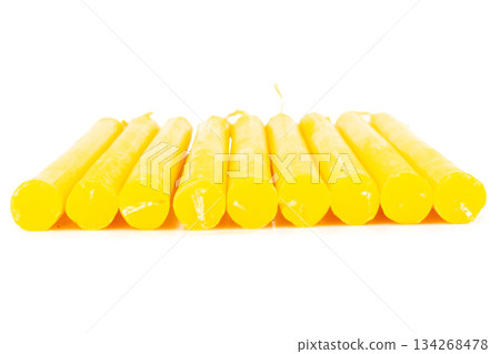 Candles for worship isolated on white background color yellow 134268478